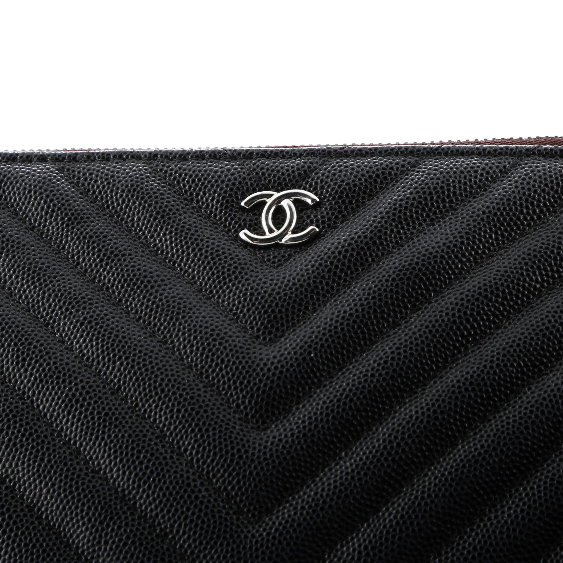 O Case Clutch Chevron Caviar Medium