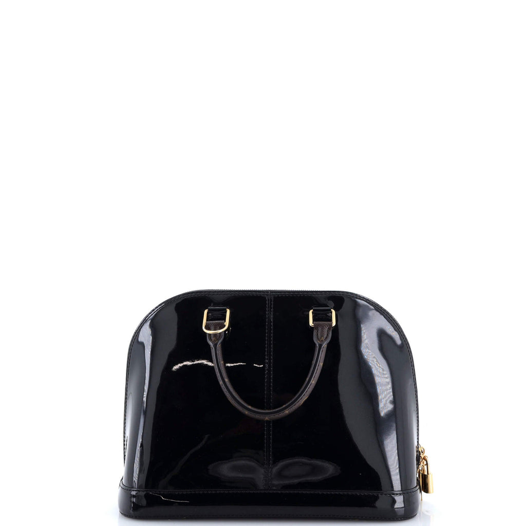 Alma Handbag Vernis with Monogram Canvas PM