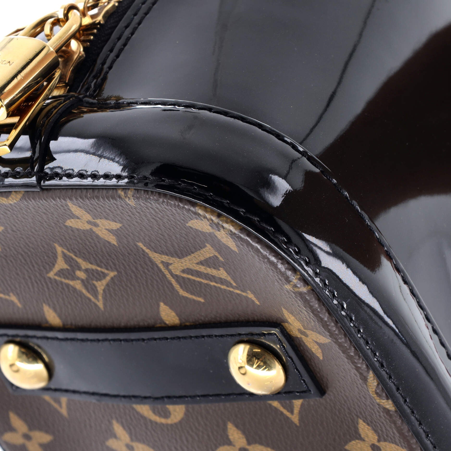 Alma Handbag Vernis with Monogram Canvas PM